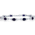 Classic Women's Bracelet - 7x5 mm Oval and Blue Diffusion Sapphire Tennis | T-7574
